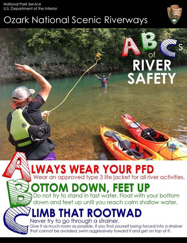 A color picture poster showing a person in the river being thrown at throw safety rope by a person on the edge of the water. Text reads: ABC's of River Safety.