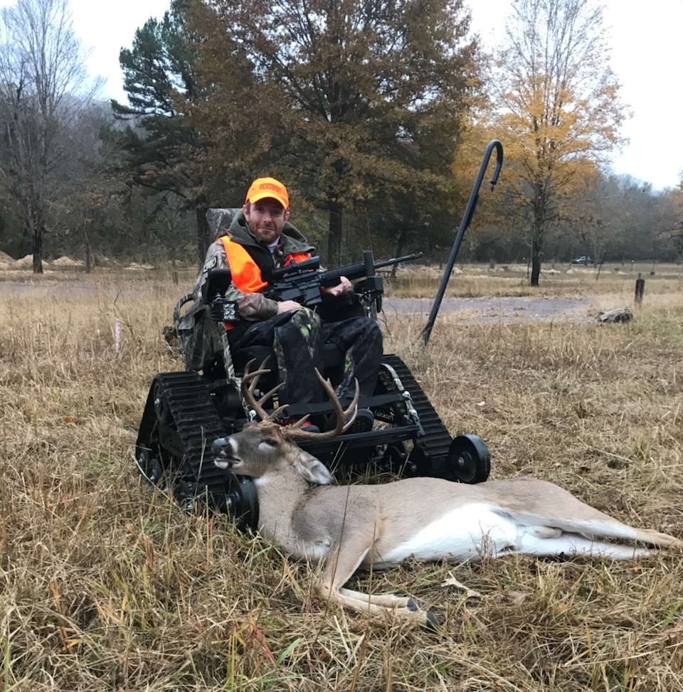 WWHunter Hunter with his harvested deer