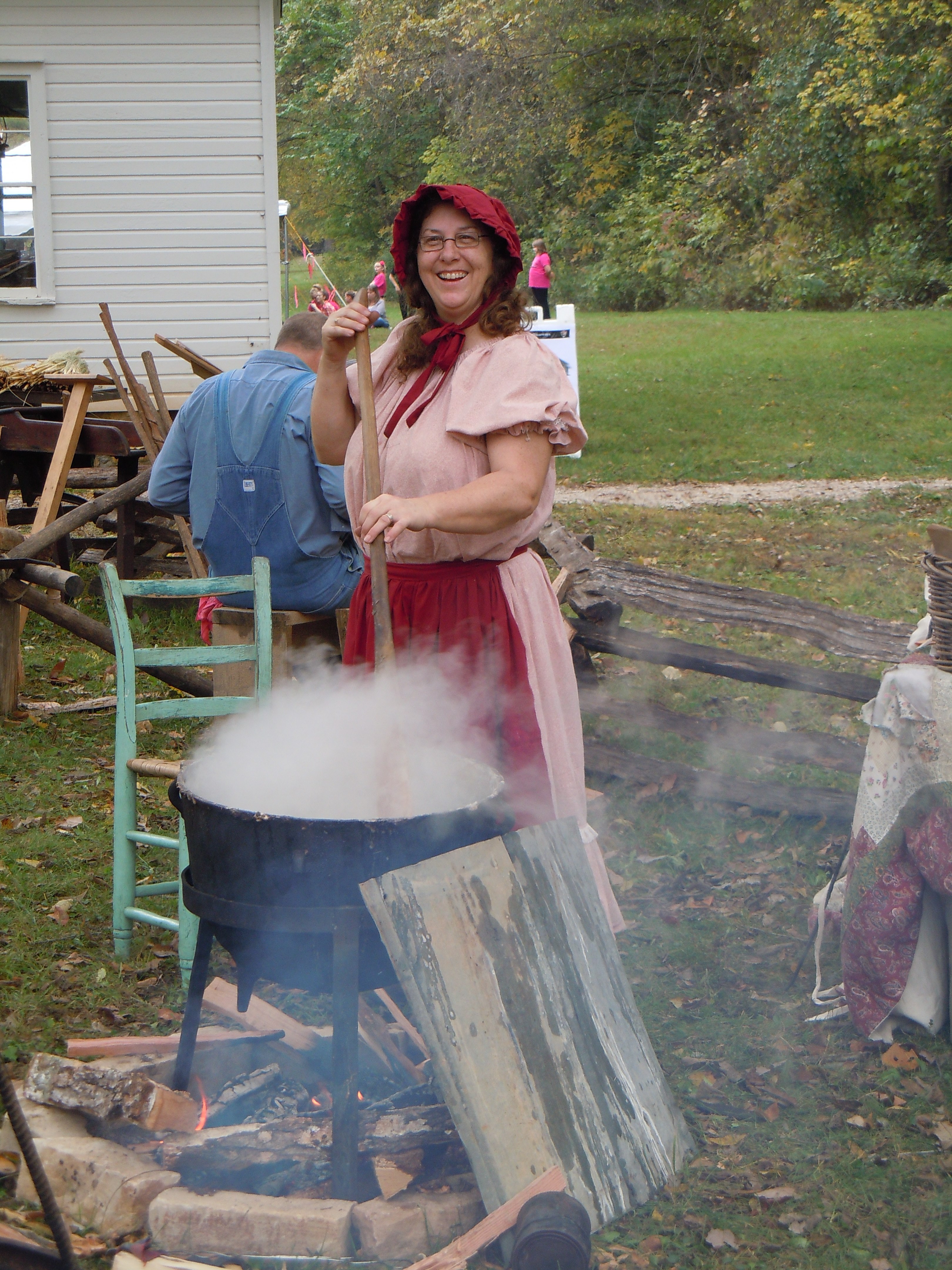 A woman making lye soap