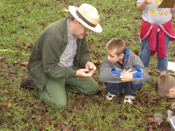 Ranger Bill O'Donnell with child