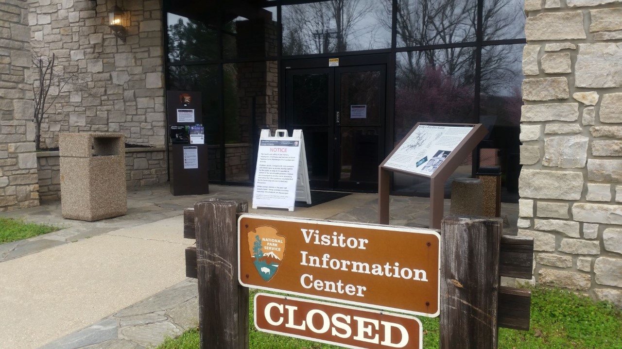 visitor information center sign, with closed