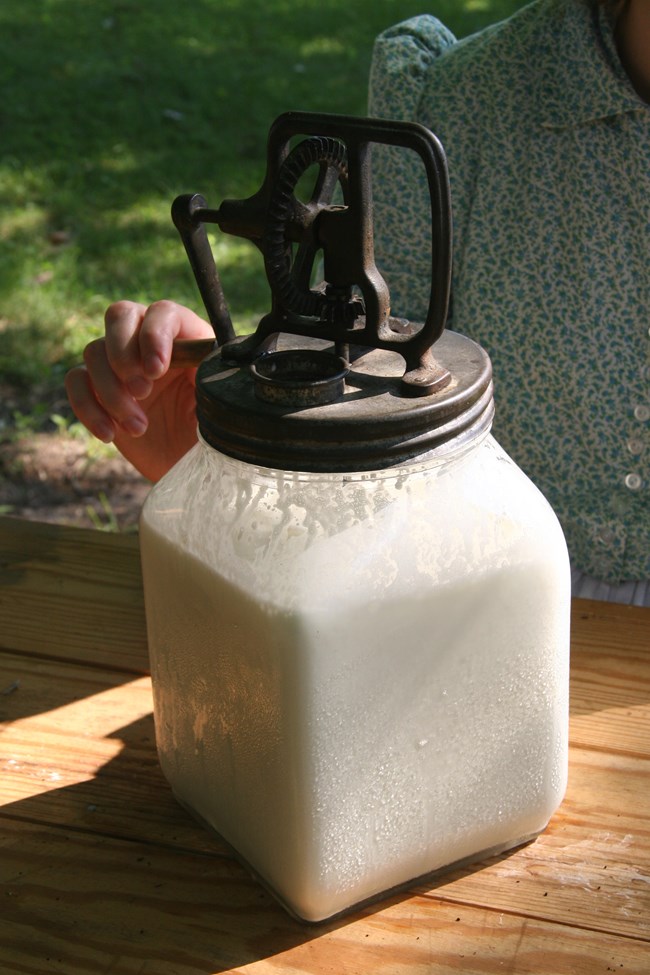 an old fashioned butter churn