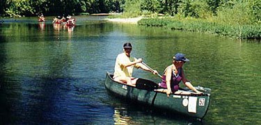 canoers on river