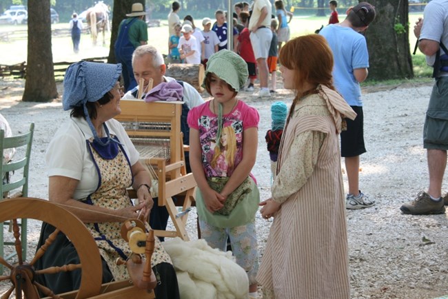 A pioneer spinner teaches her craft to youth