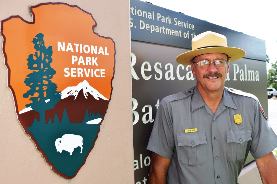 Superintendent Mark Spier Superintendent Mark Spier stands in front of sign for the Resaca de la Palma Battlefield unit.