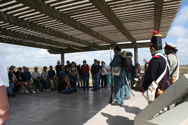 Volunteers giving a Living History program Volunteers giving a Living History program