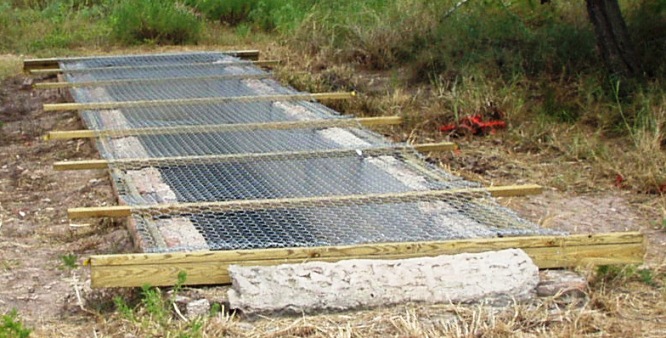 Abandoned in ground cattle dipping tank