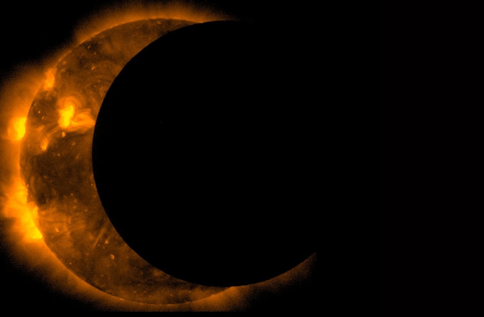 The Moon partially obscures sun during a partial eclipse