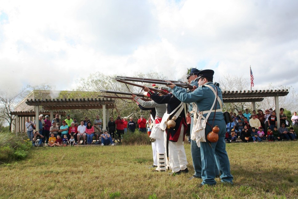 Group of living historian performs a musket demonstration. Group of living historian performs a musket demonstration.
