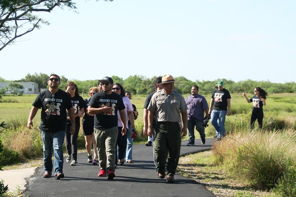 Ranger leads a group tour on the battlefield trail