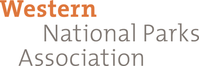A logo with the words Western National Parks Association