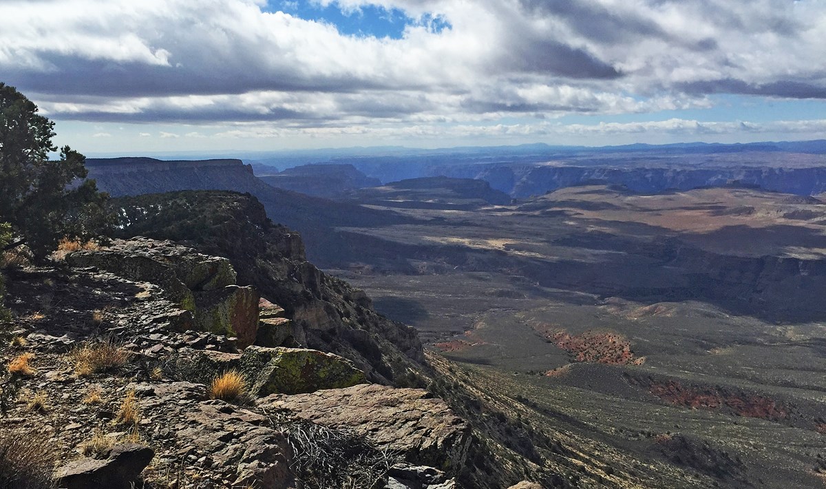 View from Snap Point to the east up the Grand Canyon with clouds in the sky