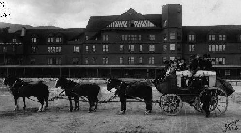 This is an image of a horse drawn stagecoach at Yellowstone National Park