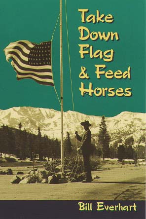 This is an image of book entitled Take Down the Flag and Feed the Horses by Bill Everhardt. [Image of a park ranger lowers the waving American flag]