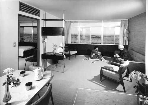 Richard Neutra chats with a resident of
the Painted Desert Community