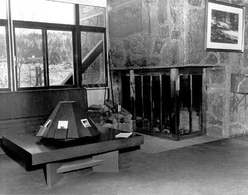 Original lobby with a fireplace and seating area