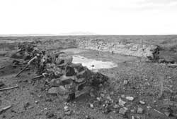 Rock and concrete wall at the military police compound