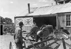 evacuee-run blacksmith shop, Koen