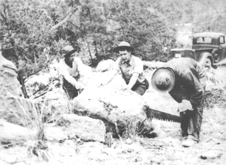 CCC enrollees sawing rock