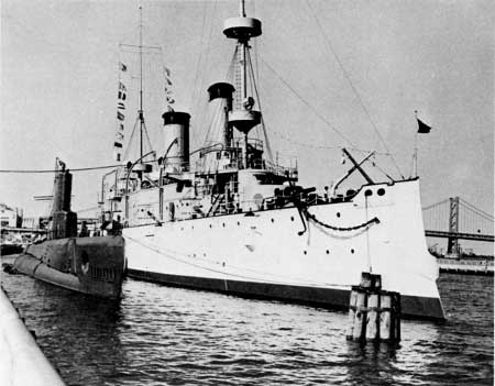 USS Becuna (left) and USS Olympia (right)