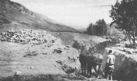 digging irrigation ditch