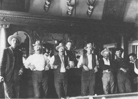 saloon patrons at bar