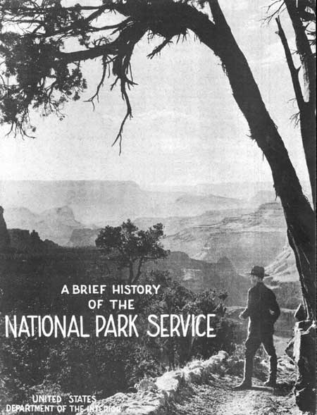 ranger looking upon the Grand Canyon