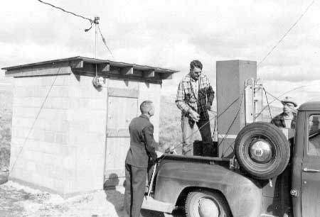 employees installing radio equipment