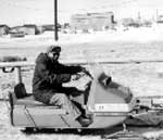 man on snowmobile