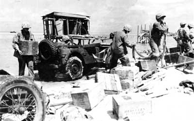 Marines carrying ammunition