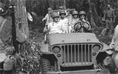 Holcomb, Edson, Vandegrift in jeep