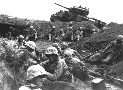 Marines resting, tank in rear