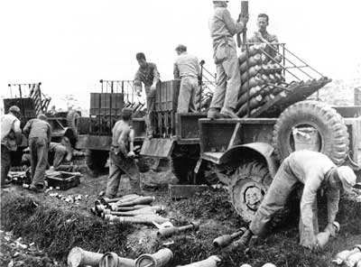 Marines loading projectiles