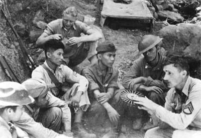 Marine platoon sergeant instructing Filipino cadets