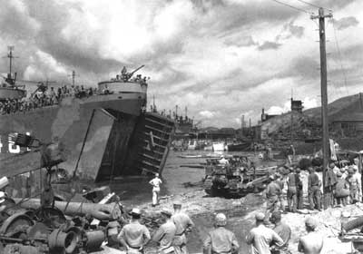 buldozer unloading from LST