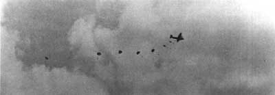  Marines trailing out of a transport plane