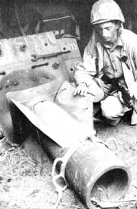 Marine with mortar shell