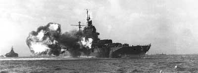 firing 14-inch guns from naval ship Idaho