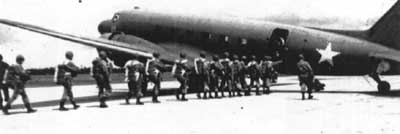 Marines boarding an R4D