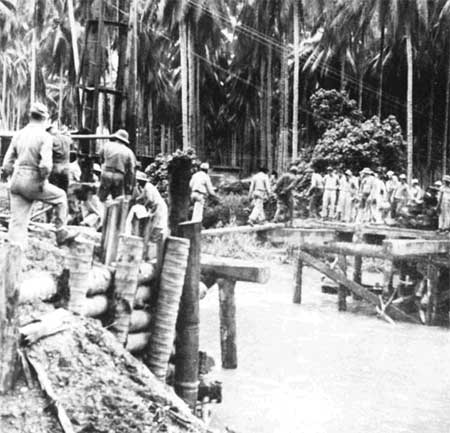 repairing washed out bridge