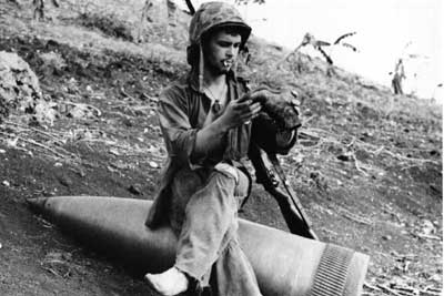 Marine sitting on shell