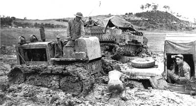 vehicles stuck in mud