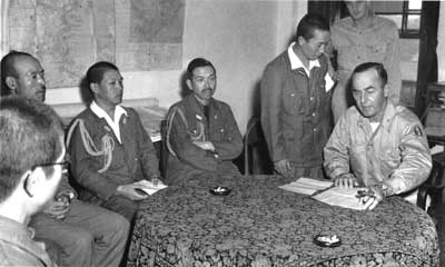 Clement with Japanese officers