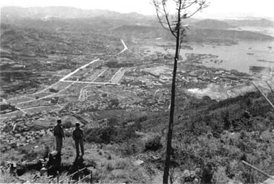 two Marines on hill overlooking Sasebo