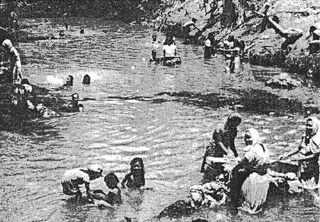 women washing clothes