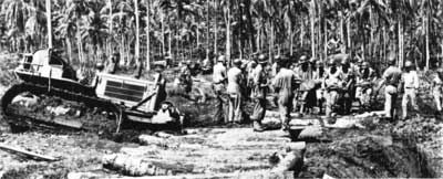 Sailors and soldiers make a corduroy road