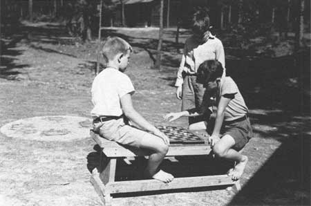 boys playing checkers