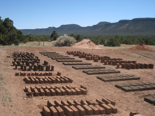 Mud bricks laid out to dry in the sun.