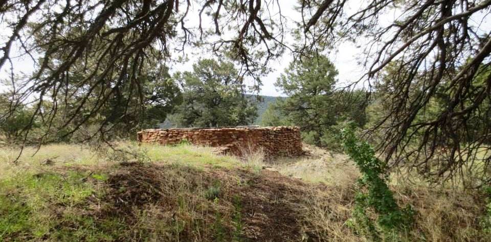 Back Country Hikes Stone Walls. Blue Skies. Green Trees. Pueblo Site.