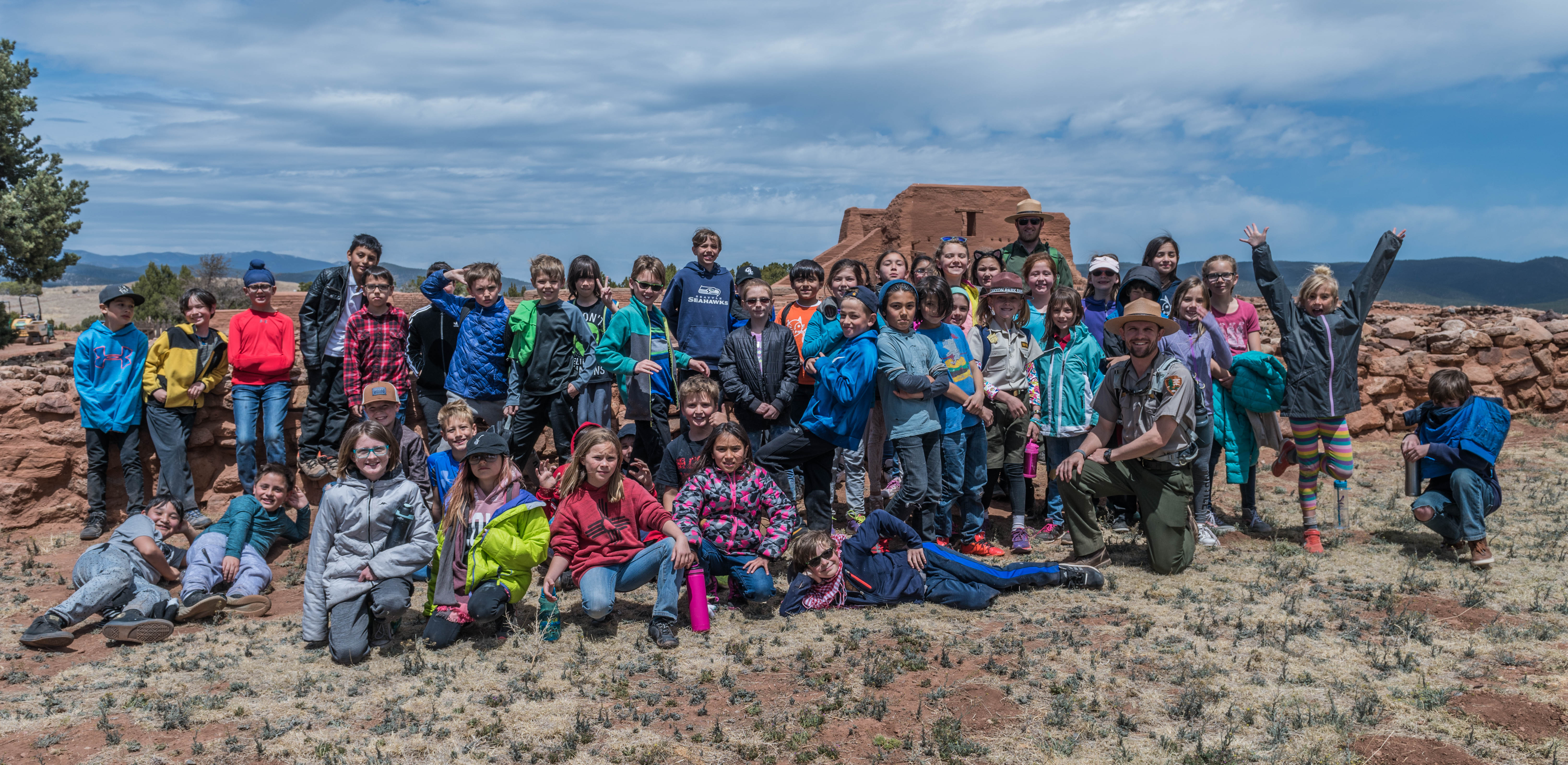 School kids celebrating a field trip to Pecos NHP with a class photo School kids celebrating a field trip to Pecos NHP with a class photo